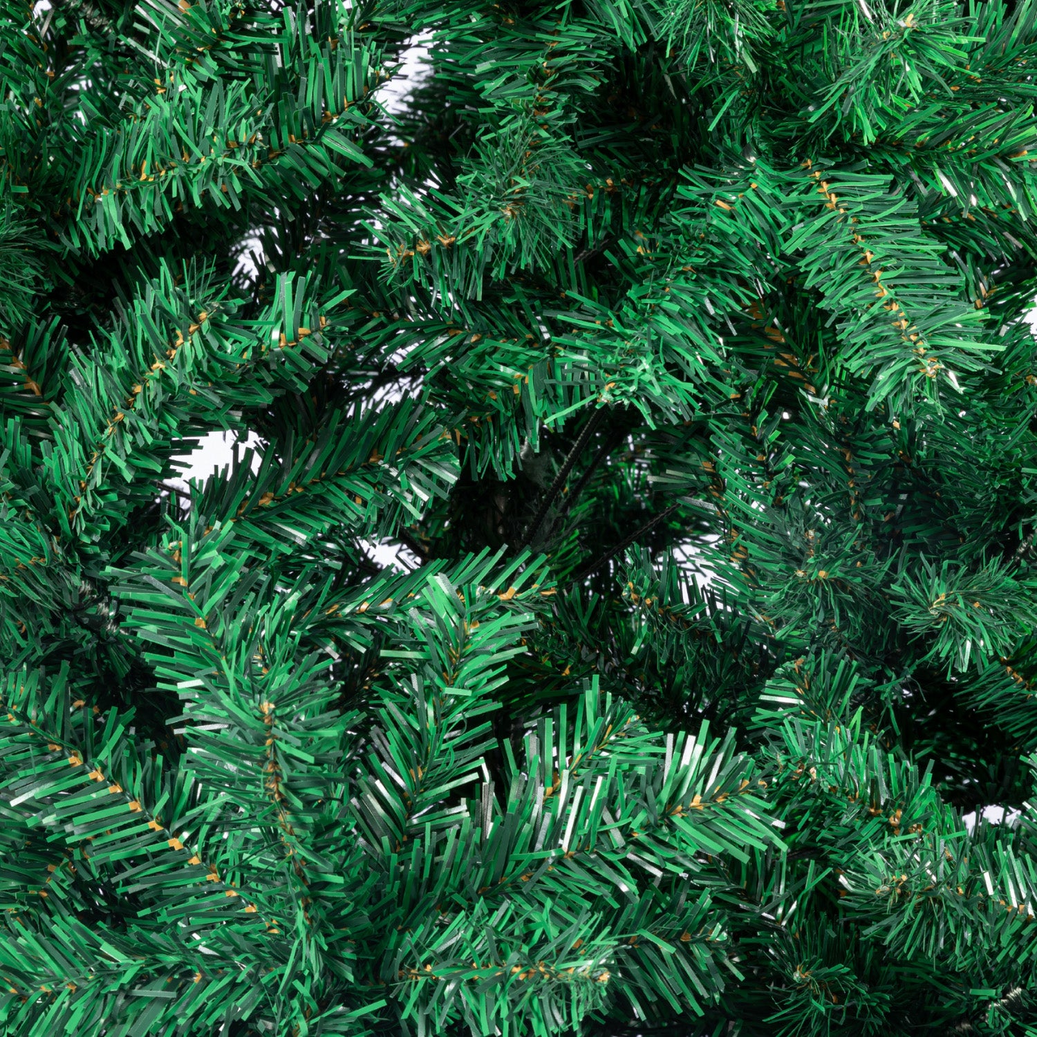 Artificial green Christmas tree needles with metallic highlight strands