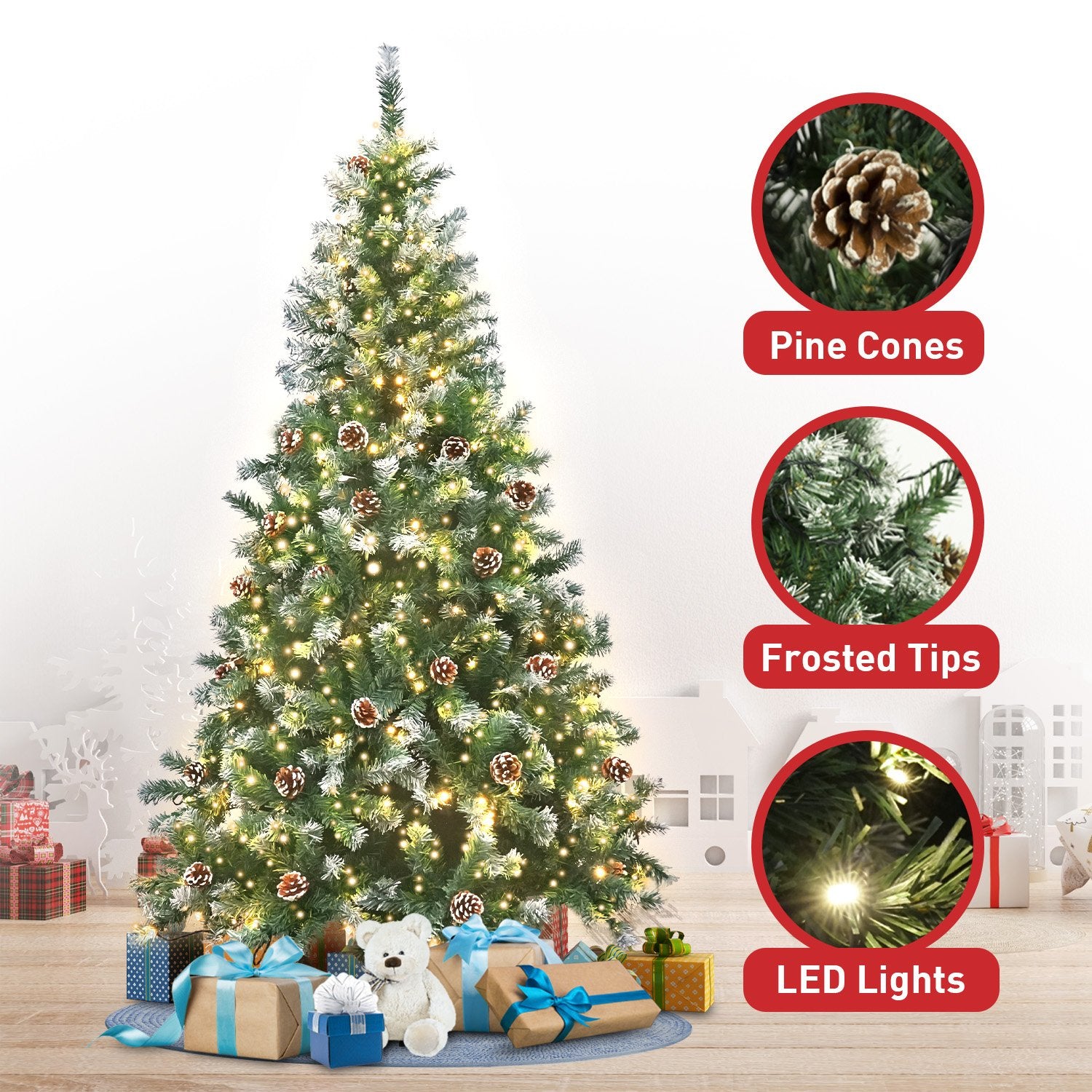 Pre-lit Christmas tree with frosted tips, pine cones, and warm LED lights
