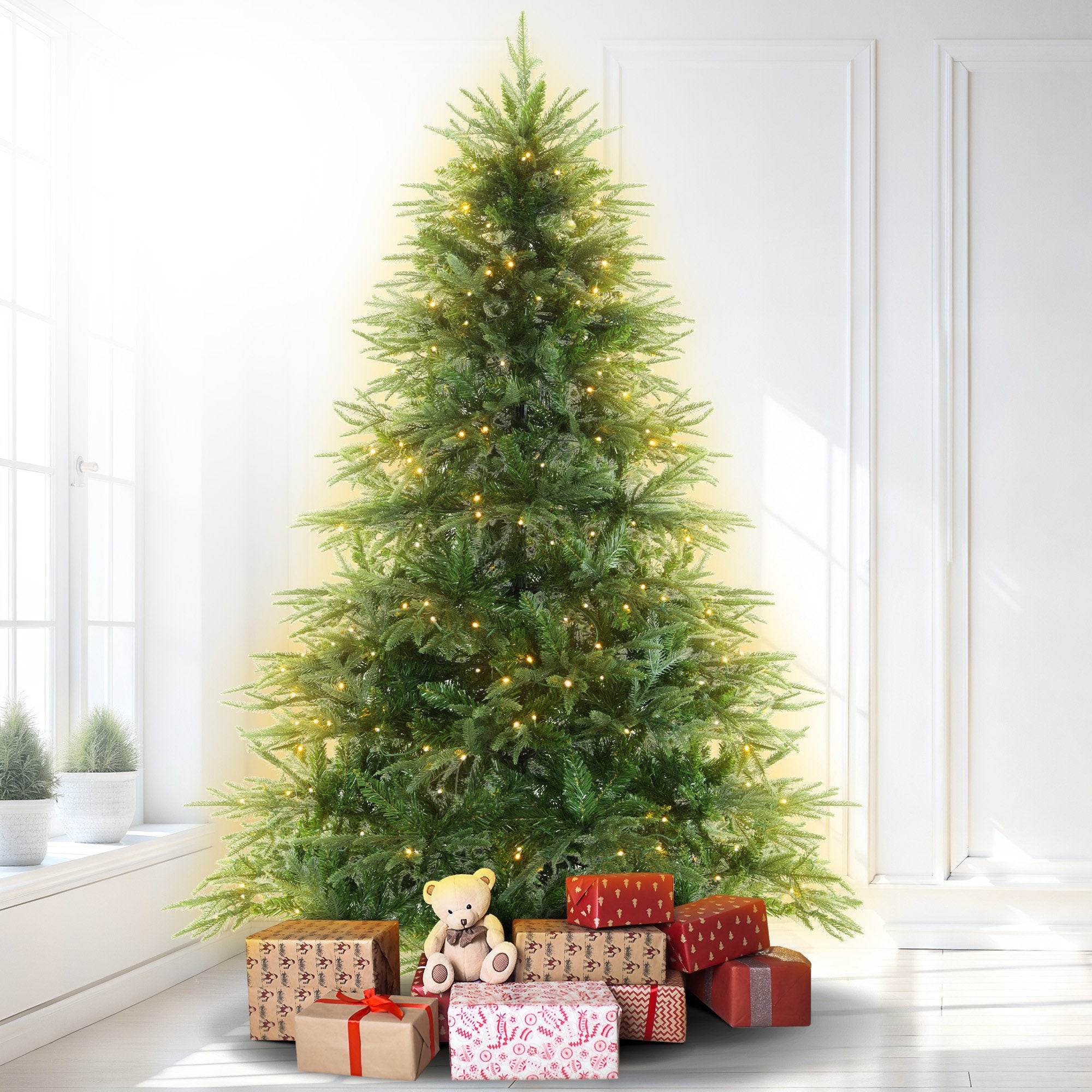Prelit fir Christmas tree with warm white LED lights, upright front view