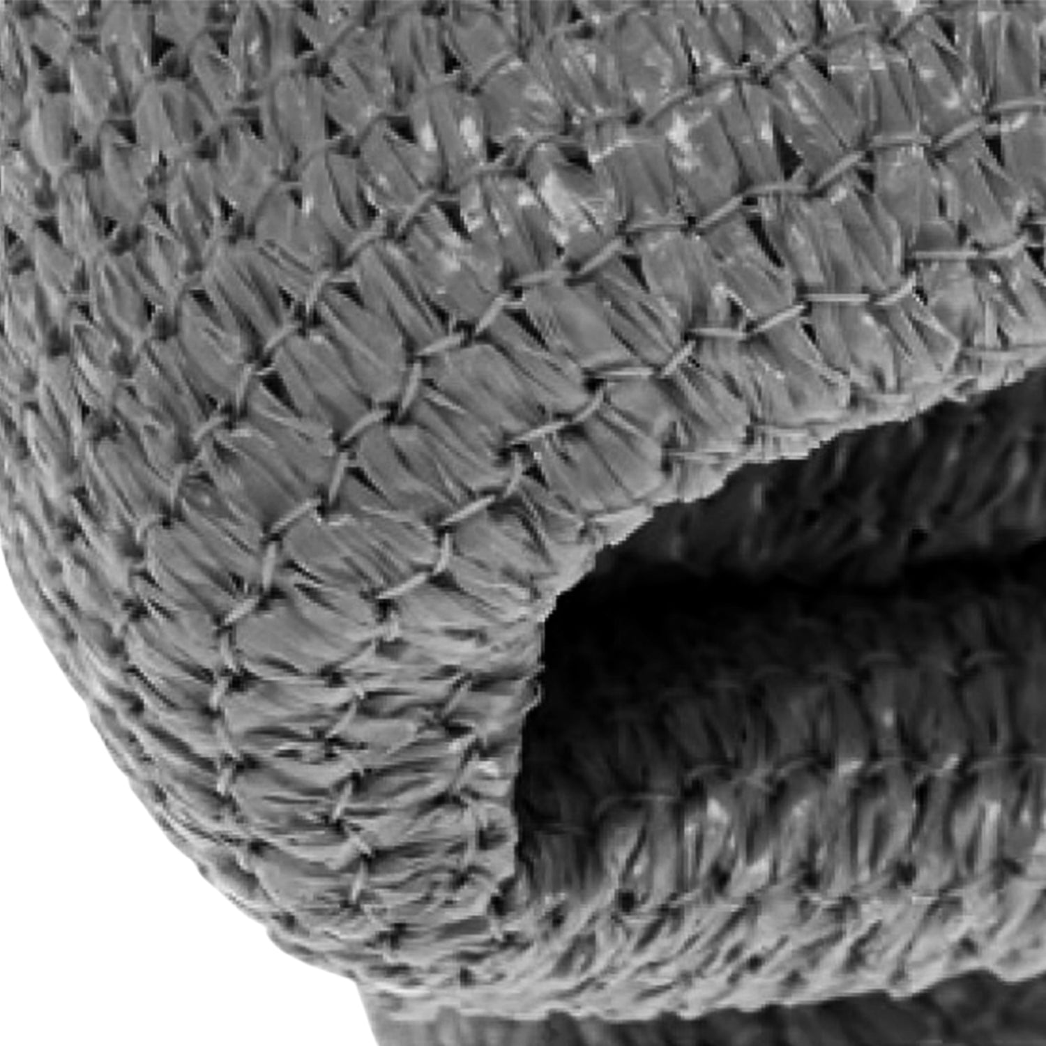 Grey woven fabric panel of a sun shade sail, close-up