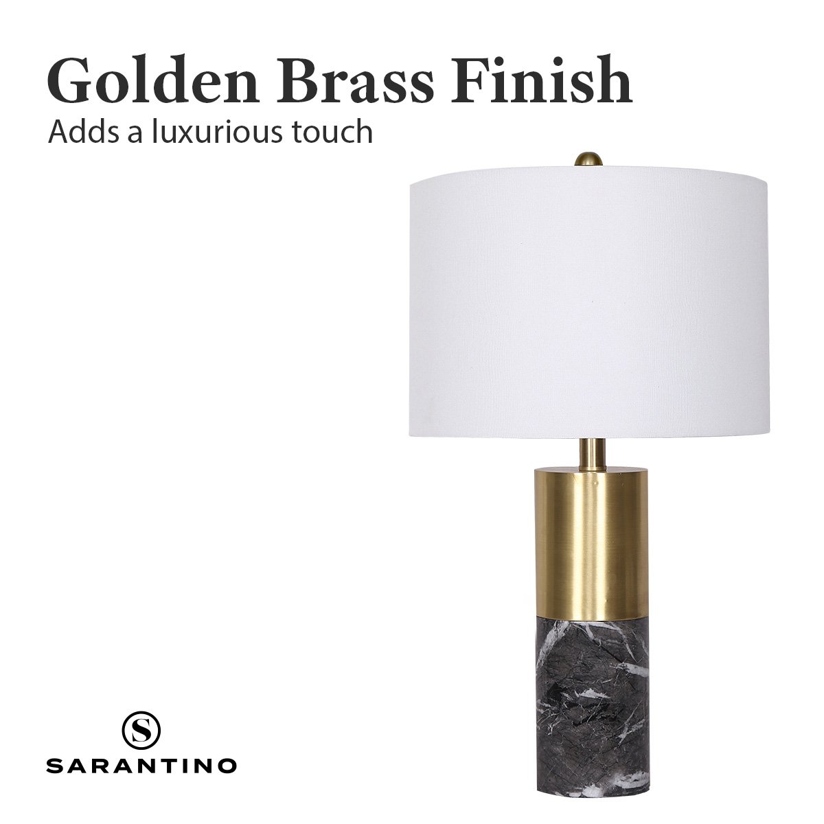 Table lamp with white shade, brass metalwork, and black marble base