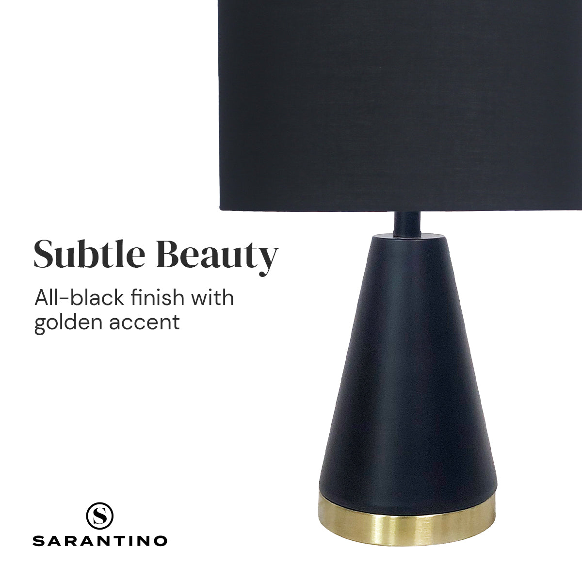 Black table lamp with fabric drum shade and gold base ring.