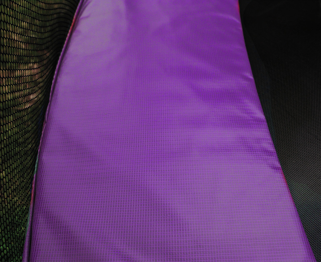 Purple trampoline replacement pad panel with textured woven surface