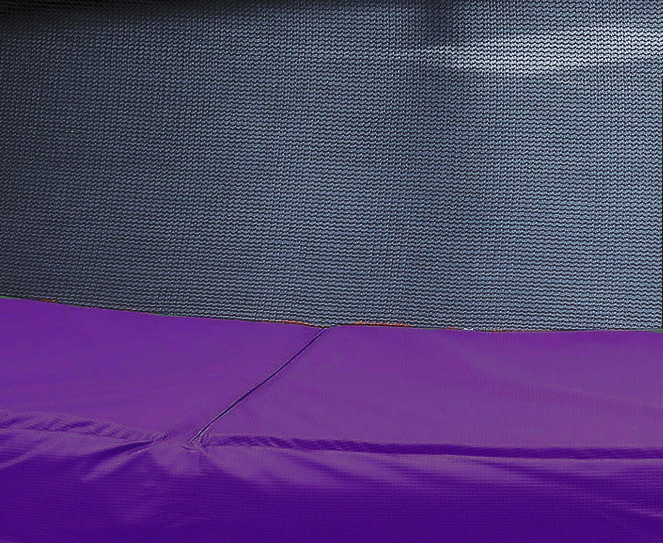 Purple and dark gray trampoline replacement pad with visible seam lines