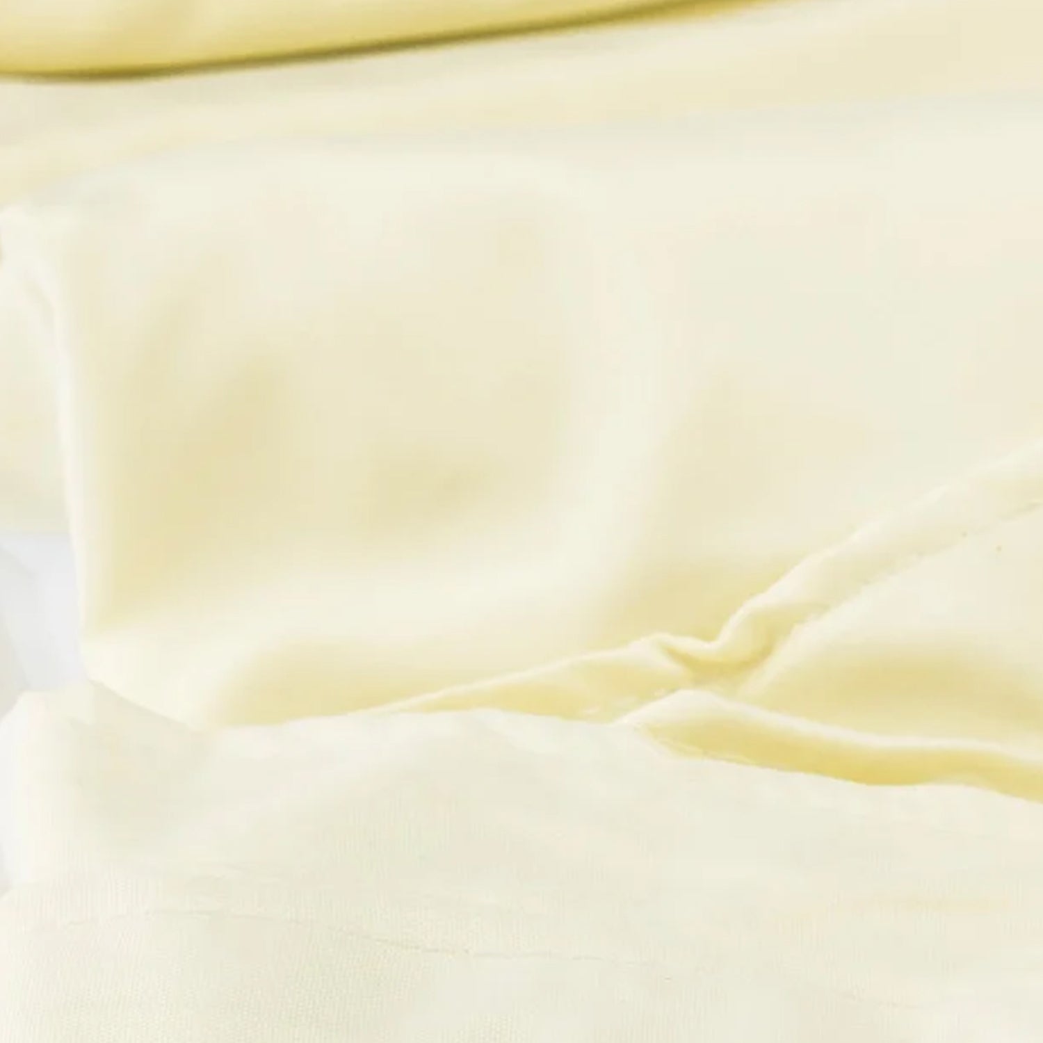 Waterproof shade sail fabric close-up in pale yellow