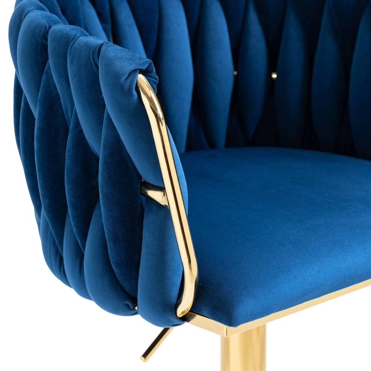 Navy velvet bar stool with tufted backrest, gold footrest and pedestal base