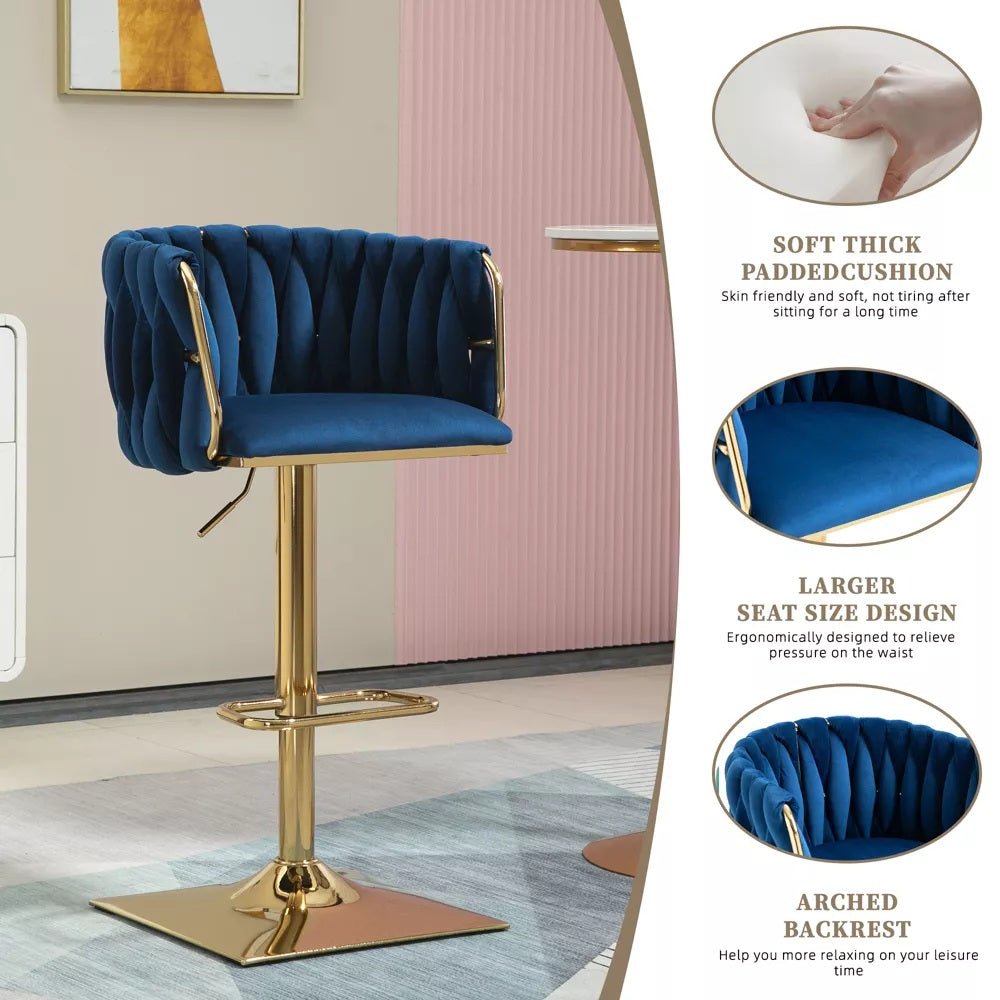 Navy velvet bar stool with arched tufted backrest, padded seat, and gold pedestal base