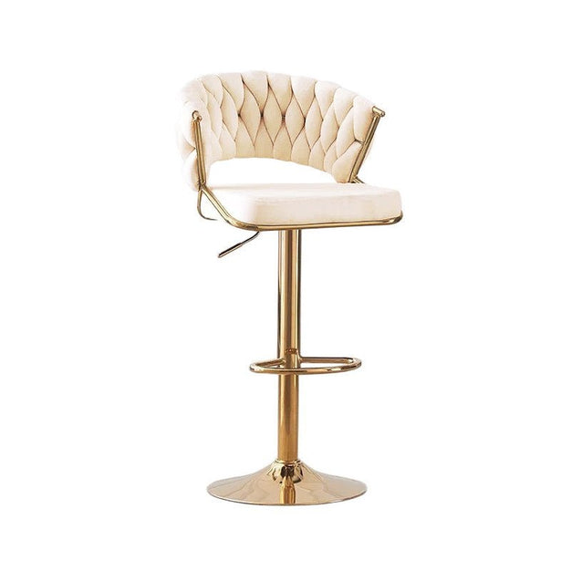 Beige velvet bar stool with tufted back, round gold base, and padded seat