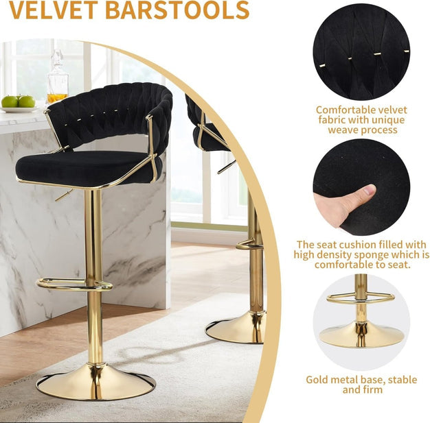 Black velvet bar stool with tufted back, gold metal base, and curved armrests