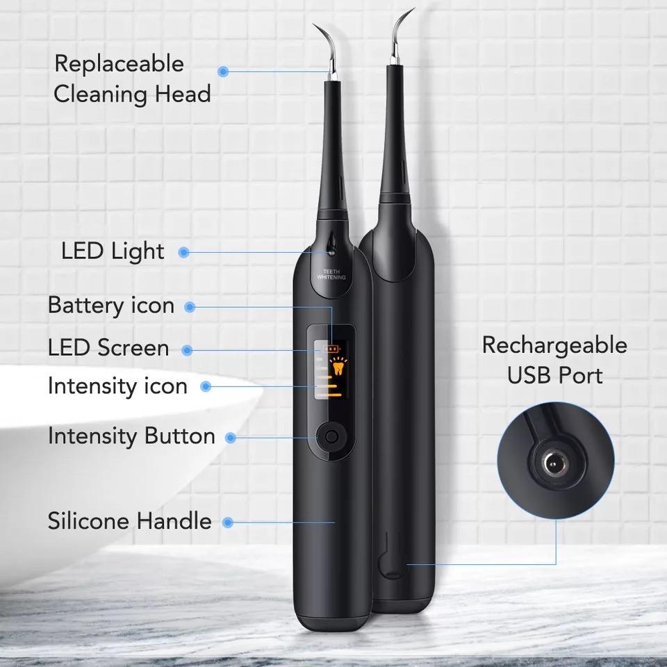 Electric ultrasonic dental scaler with LED light and screen, silicone handle, and USB rechargeable port.