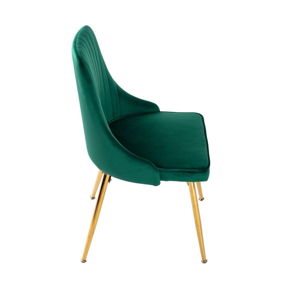 Green velvet upholstered dining chair with curved armrest and gold tapered legs