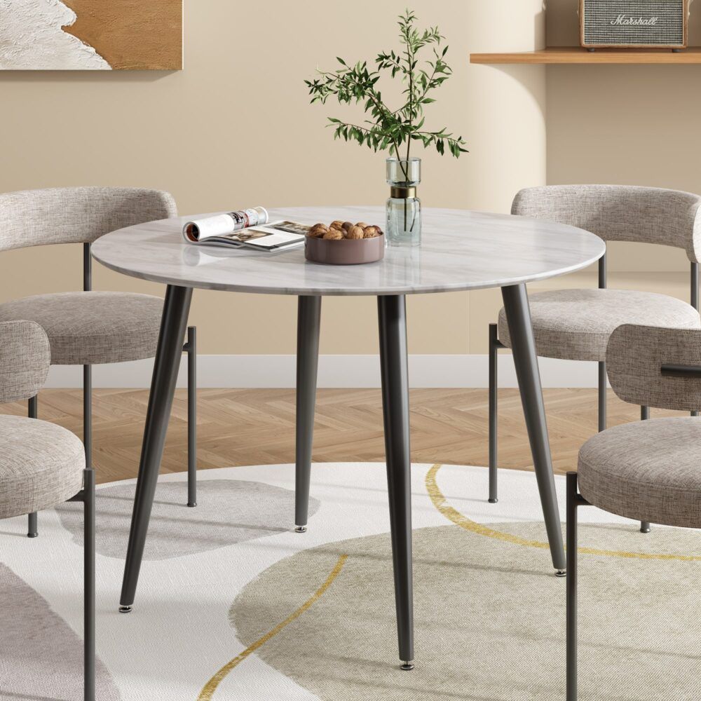 Round MDF marbling dining table with white-gray top and black tapered legs