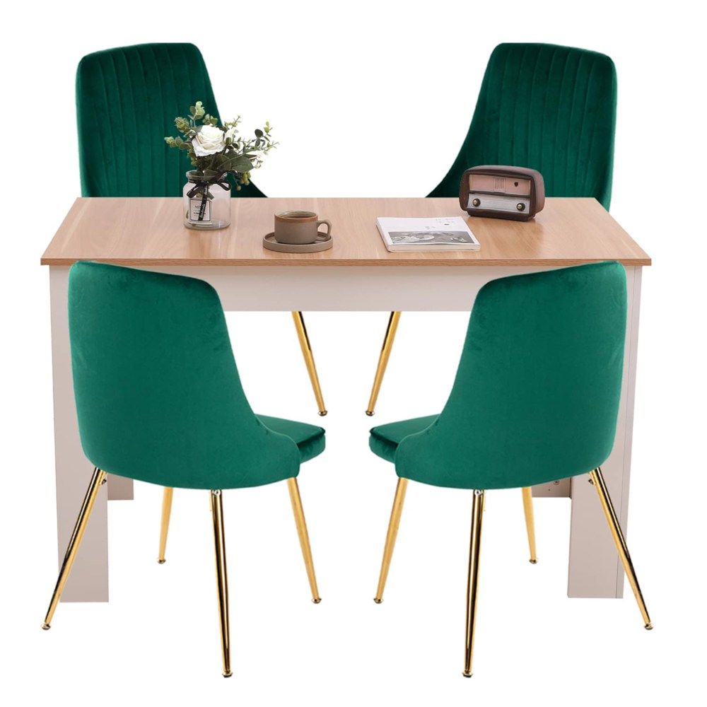 Grey rectangular dining table with four green velvet dining chairs, front view
