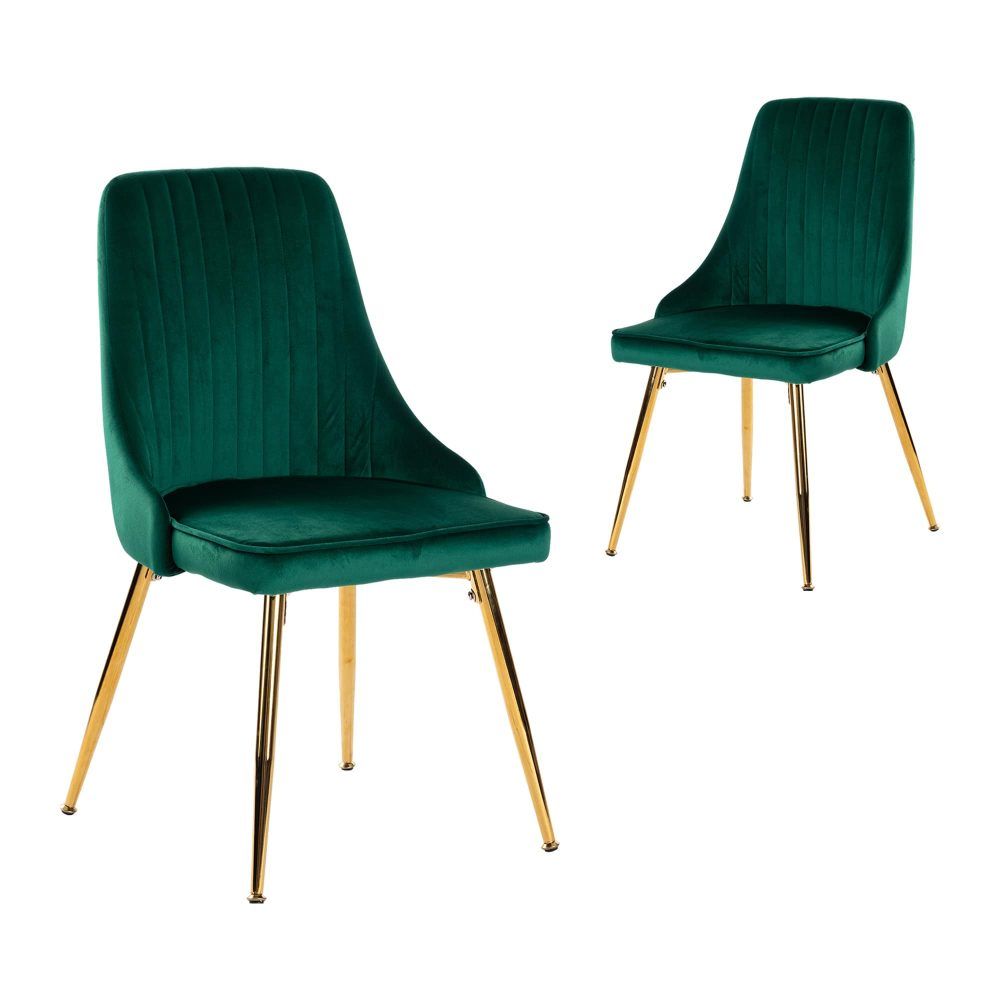 Two green velvet dining chairs with curved backs and gold metal legs