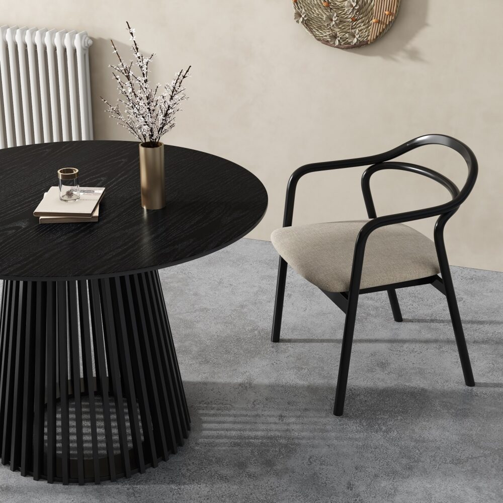 Round dining table with dark top and vertical slat pedestal base