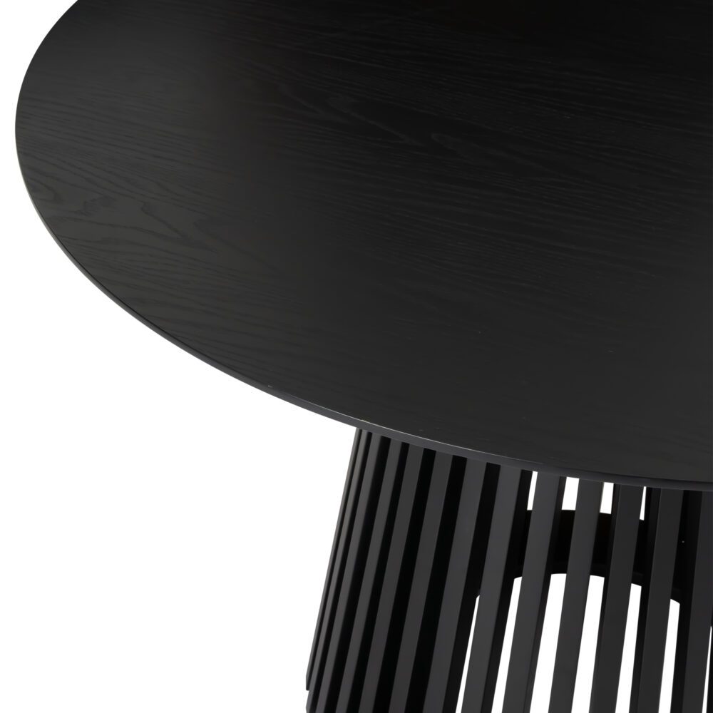 Dark round dining table top with subtle wood-grain texture