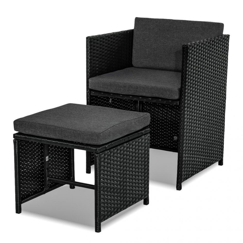 Black rattan dining armchair with dark cushion and matching ottoman