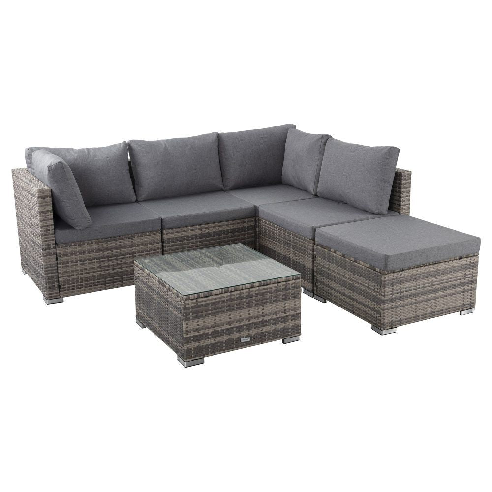 Outdoor ottoman-style sectional set with grey cushions and woven ottoman coffee table