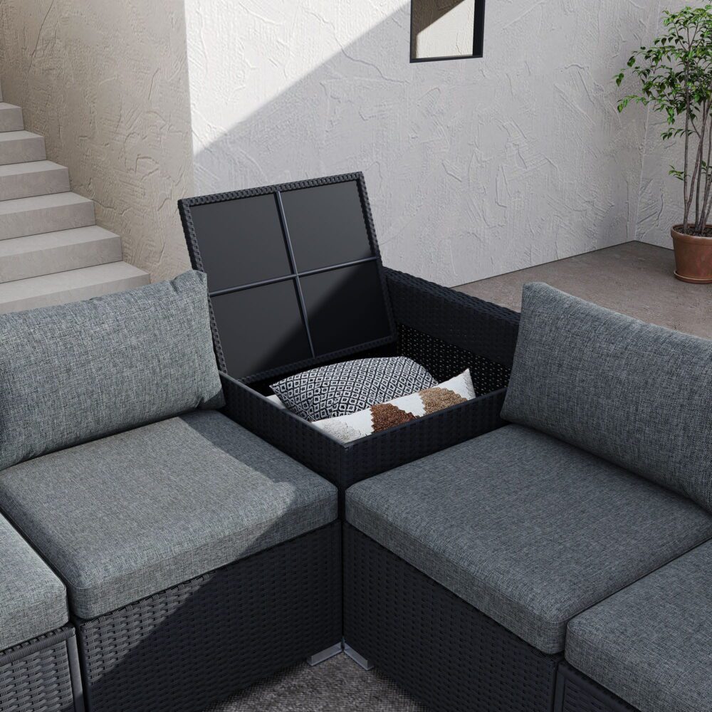 Modular outdoor sofa corner with open storage lid, dark woven seating, gray cushions