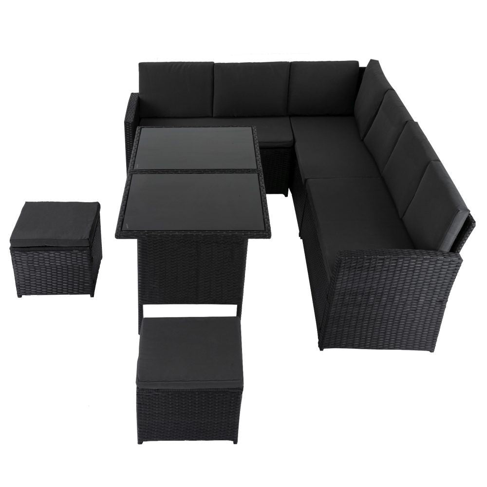 Black modular corner outdoor lounge dining set with square table and cushioned ottomans