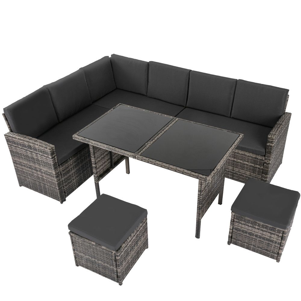 Modular outdoor seating set with dark grey cushions, woven corner sofa, and coffee table