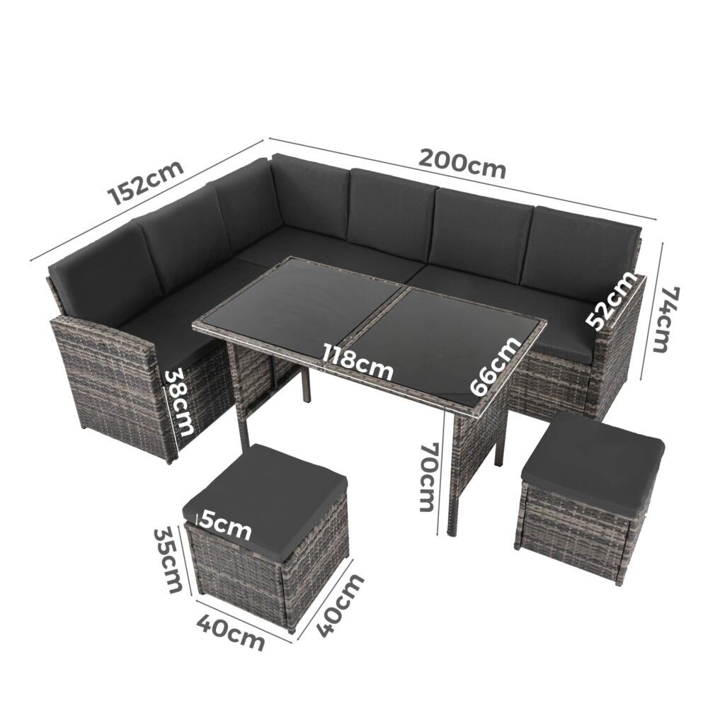 Dark grey woven outdoor dining lounge corner set with table, bench seats, and stools.