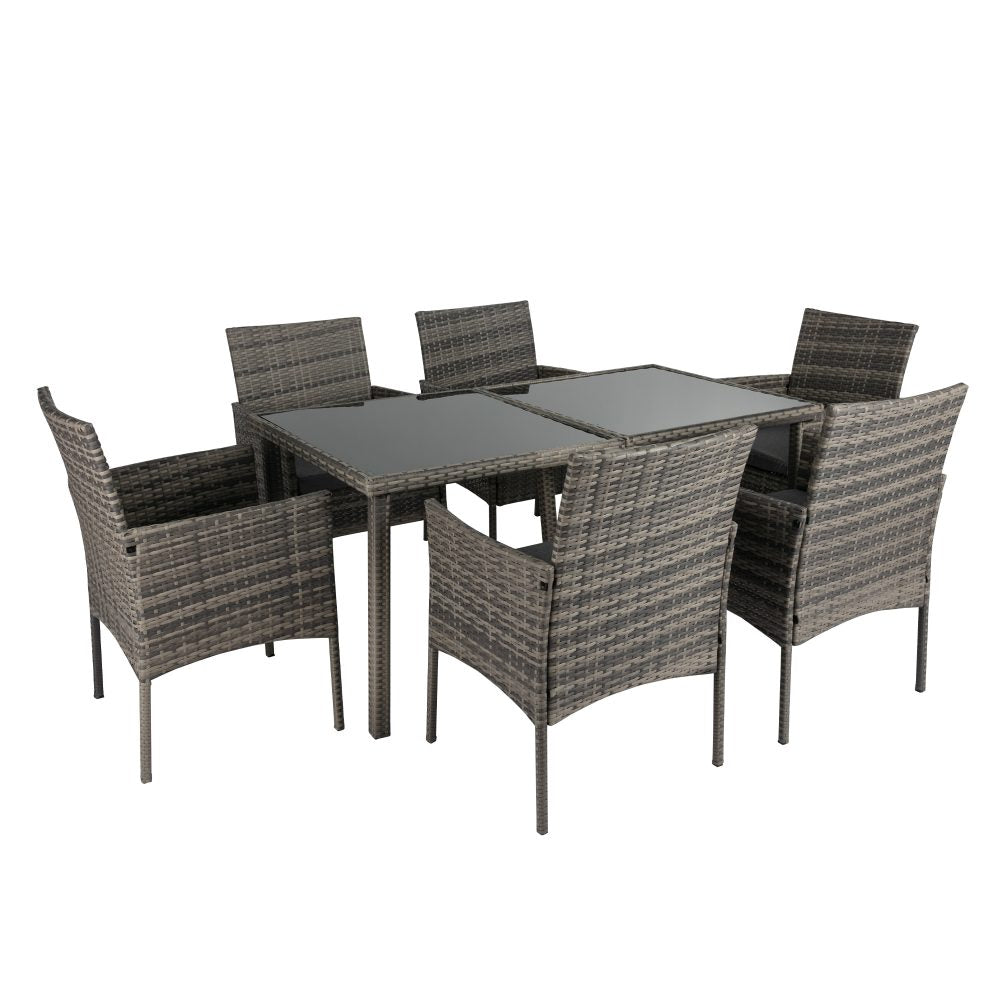 Grey wicker dining set with rectangular table and six chairs, wide side view
