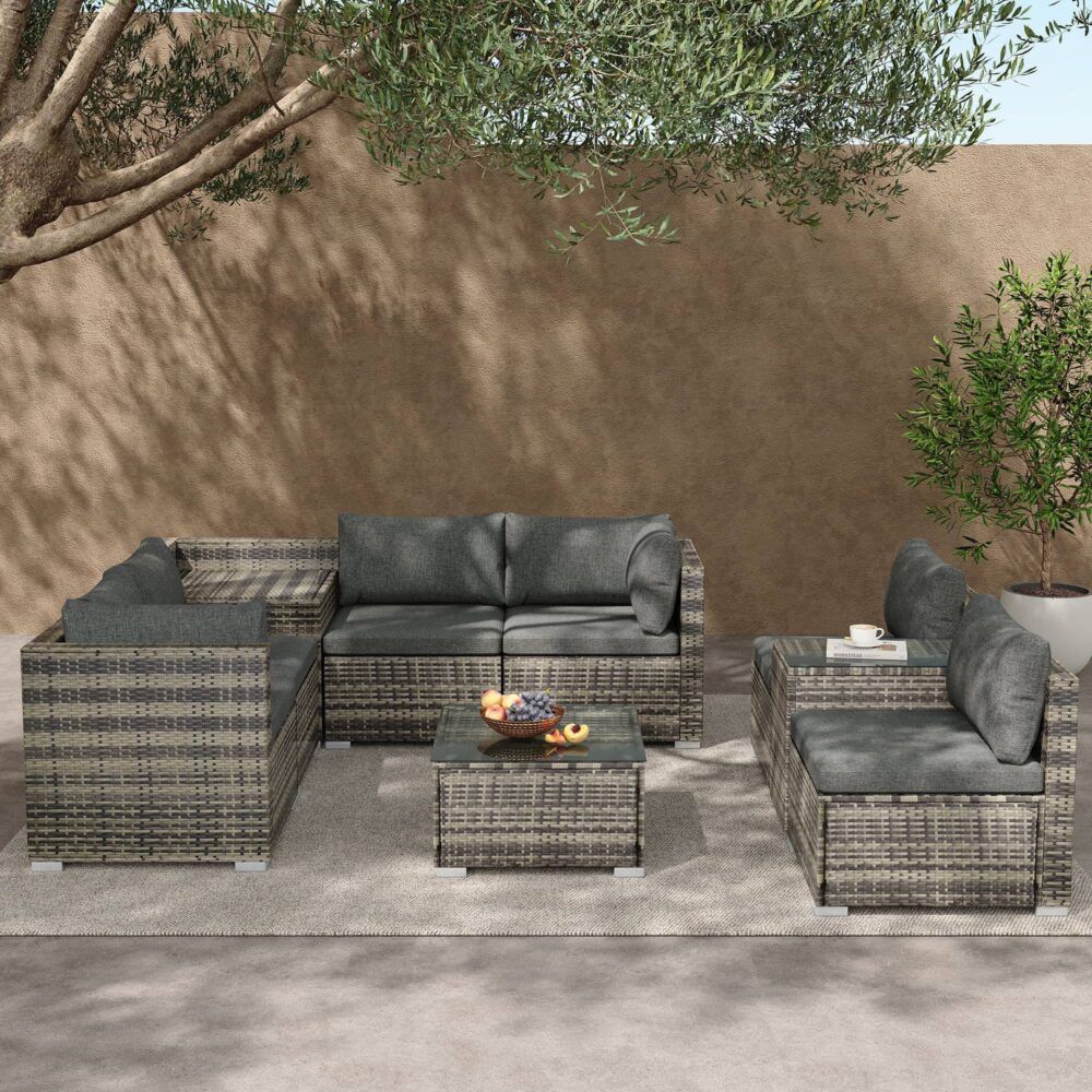Gray-cushioned outdoor sectional with woven-style frames and matching ottomans and table