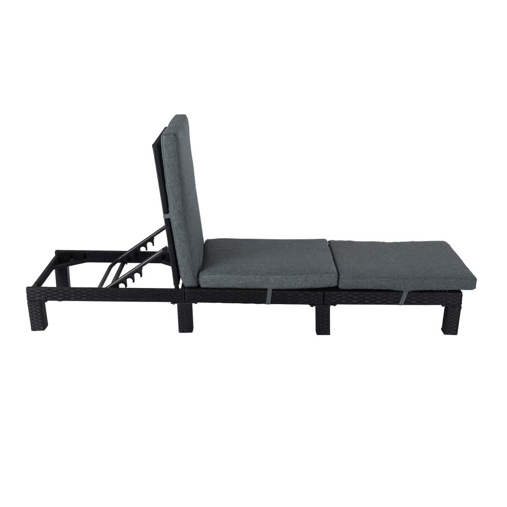 Adjustable outdoor rattan sunbed with gray seat cushion and upright headrest