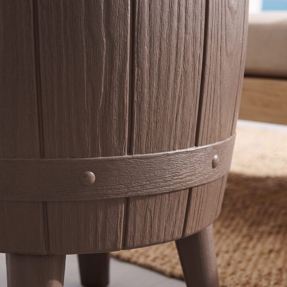 Taupe cooler table side panel close-up with woodgrain texture and metal rivets