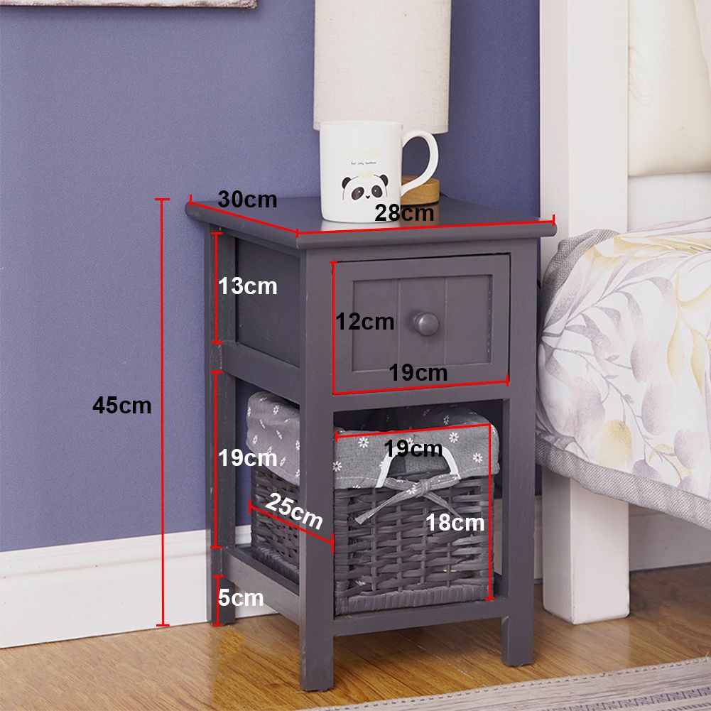 Grey bedside table with wicker basket, open shelf, and single drawer