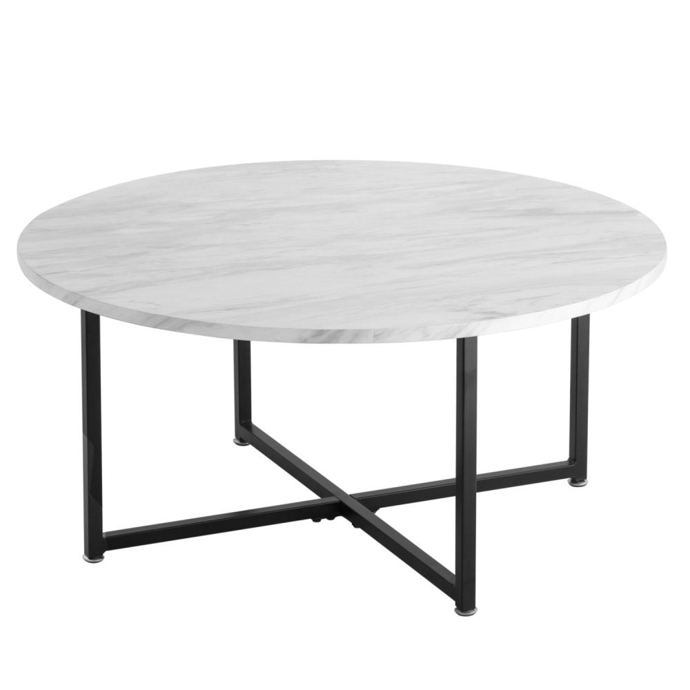 Round coffee table with white marble-effect surface and black cross base