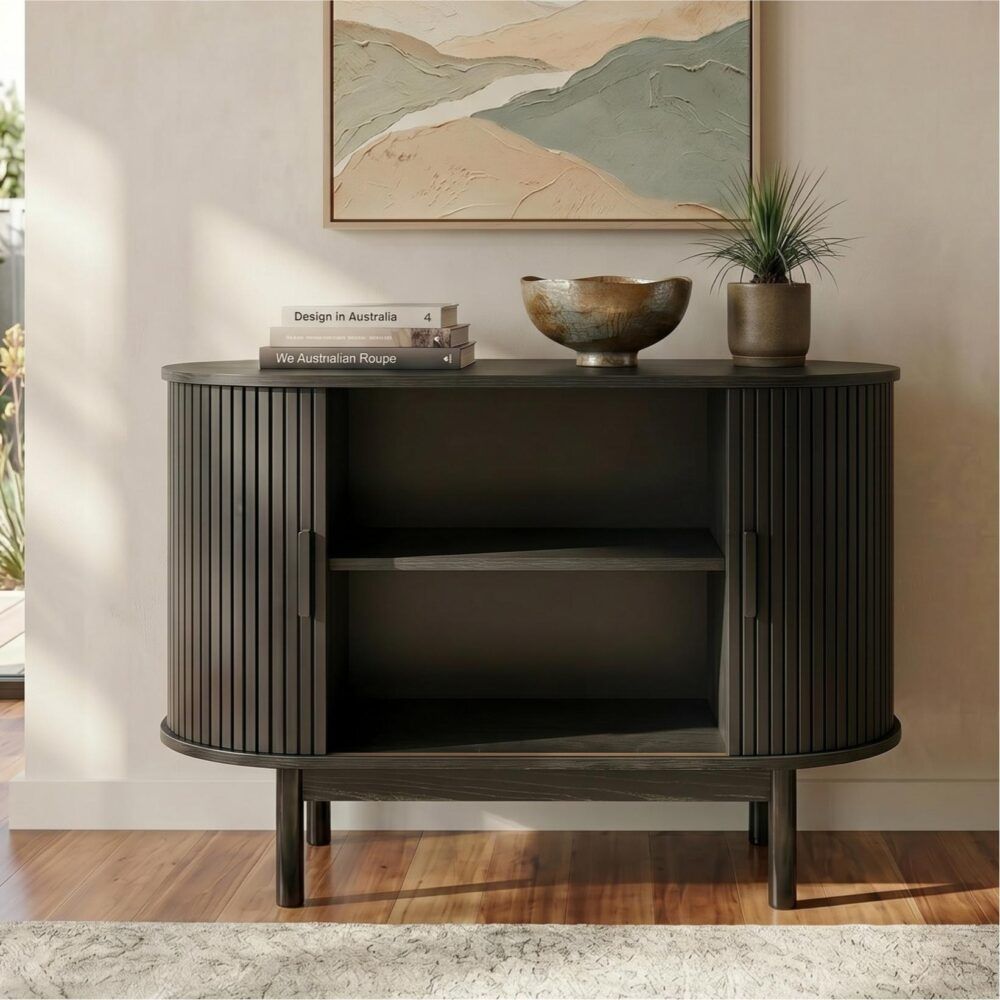 Black ribbed sideboard cabinet with open shelf interior, vertical slat doors, and legs