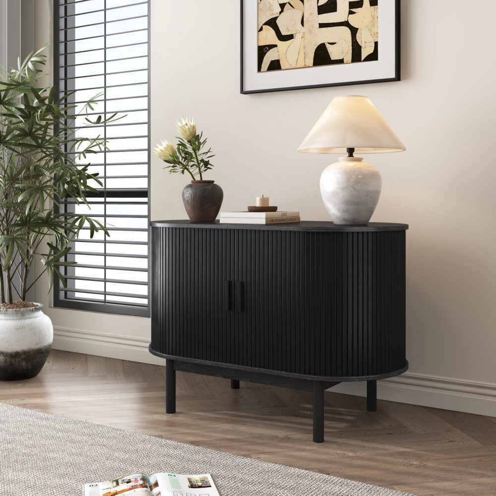 Black ribbed sideboard cabinet with round corners, vertical slats, and dark bar pull handles