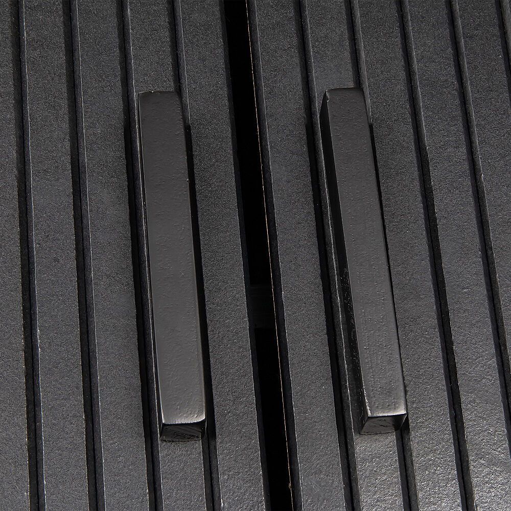Black ribbed cabinet door texture detail with recessed vertical panels and center seam