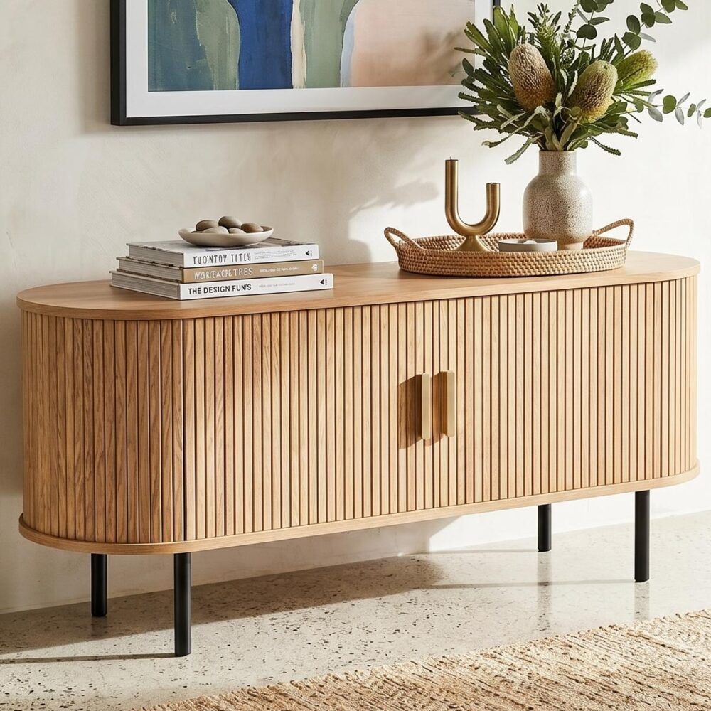 Ripple sideboard with sliding doors, light wood vertical slats, brass tone bar pulls, dark legs