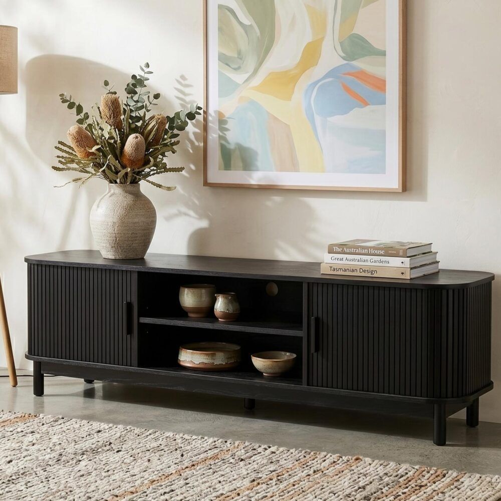Ribbed black media console with two doors and an open center shelf