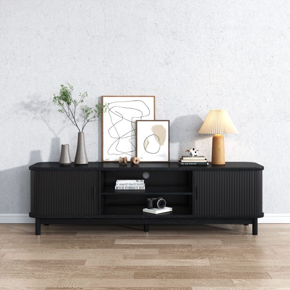 Ribbed black media console with three compartments and two cabinet doors