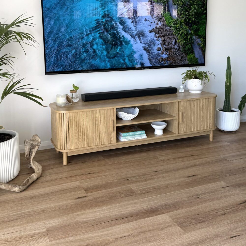 Natural ribbed media console with open center shelf and side cabinet doors