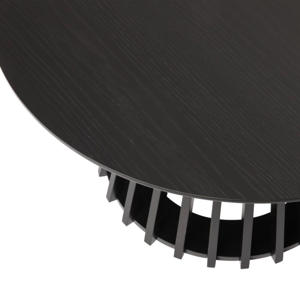 Round tabletop edge with slatted pedestal legs underneath in dark wood.