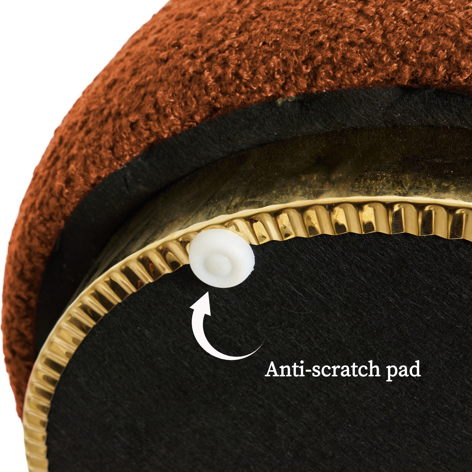 Ottoman stool underside with anti-scratch pad and black base under orange fabric