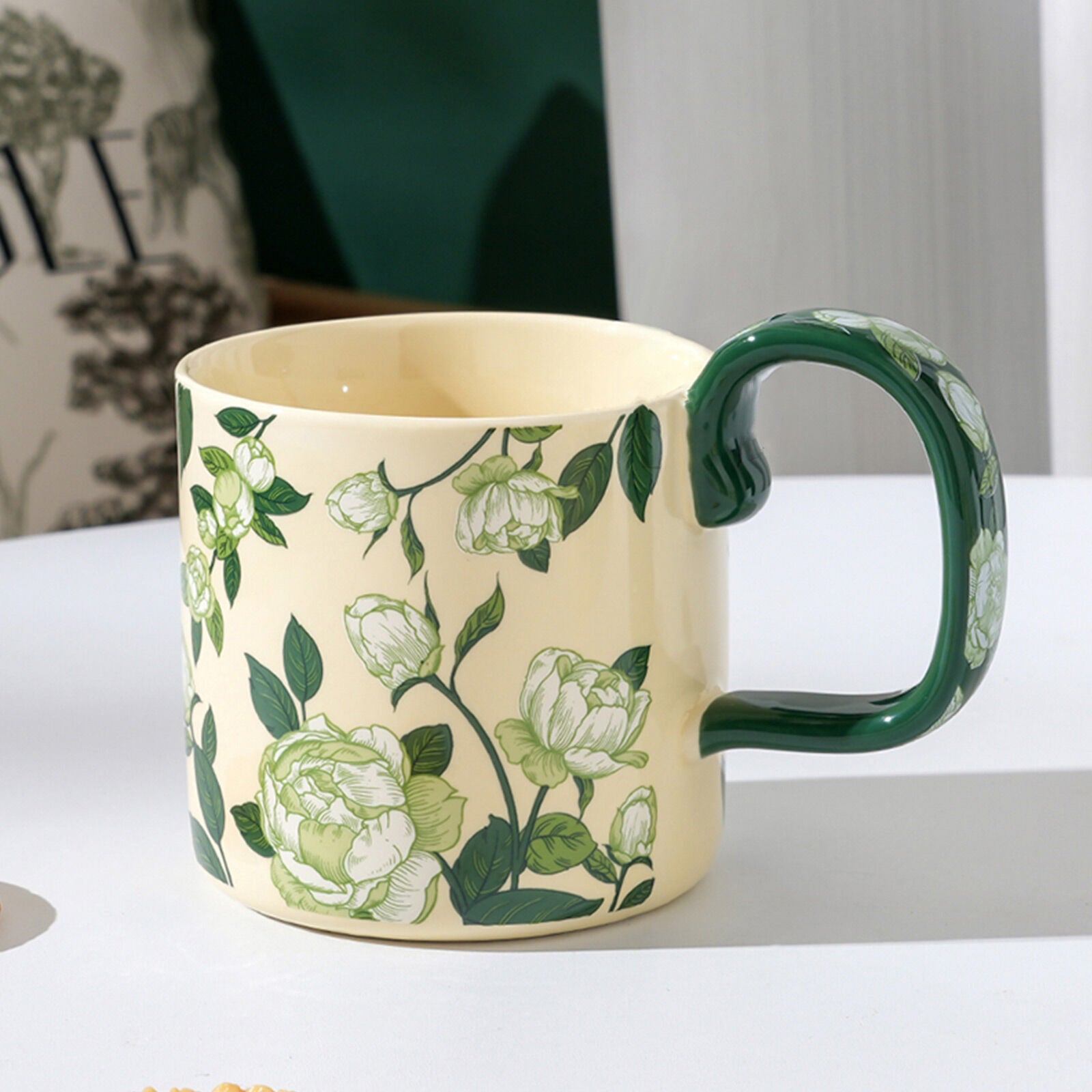 Ceramic porcelain mug with green handle and light green rose leaf floral print