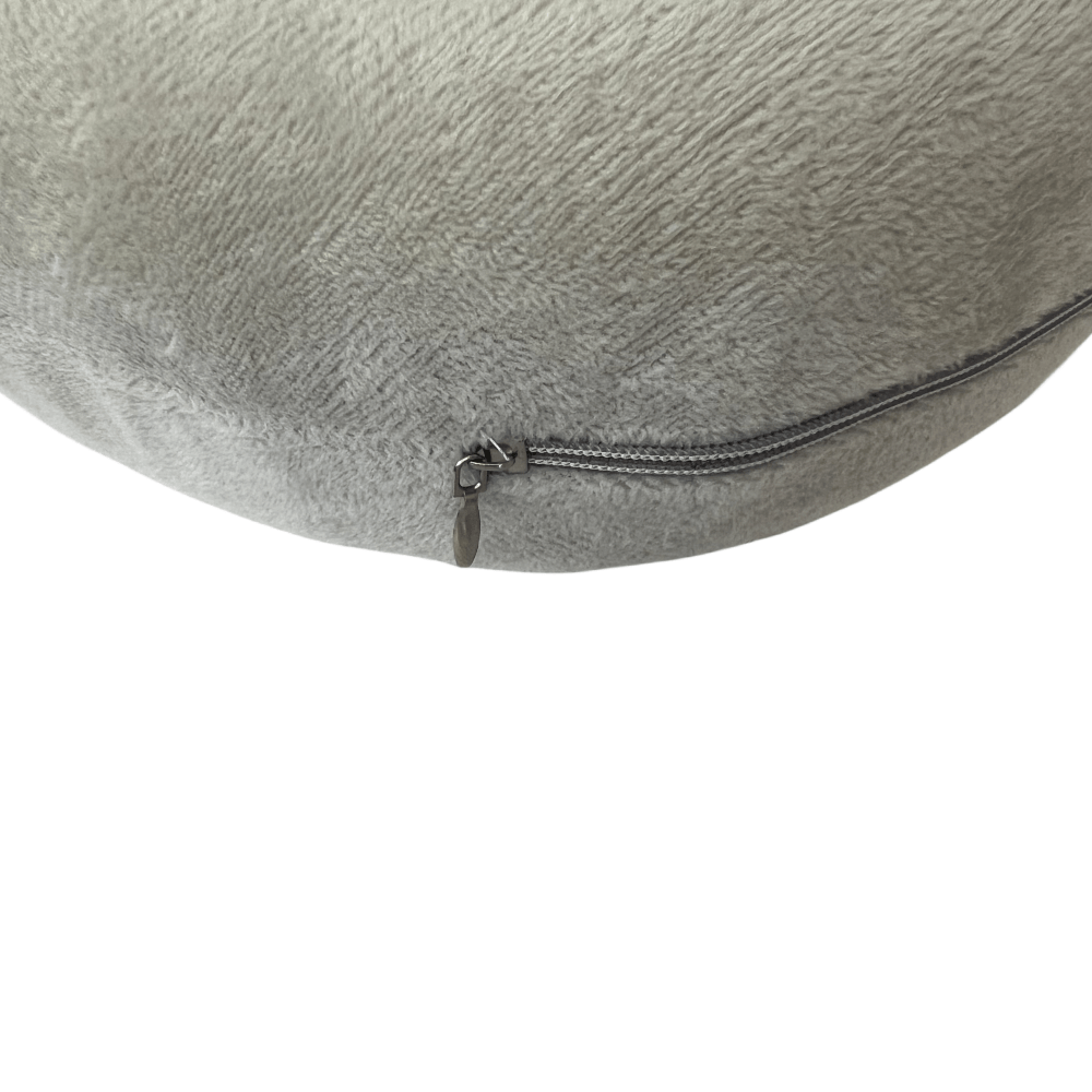 Light gray U-shaped neck pillow with black zipper along the edge