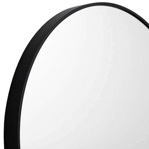 Black metal mirror frame detail with smooth rounded border