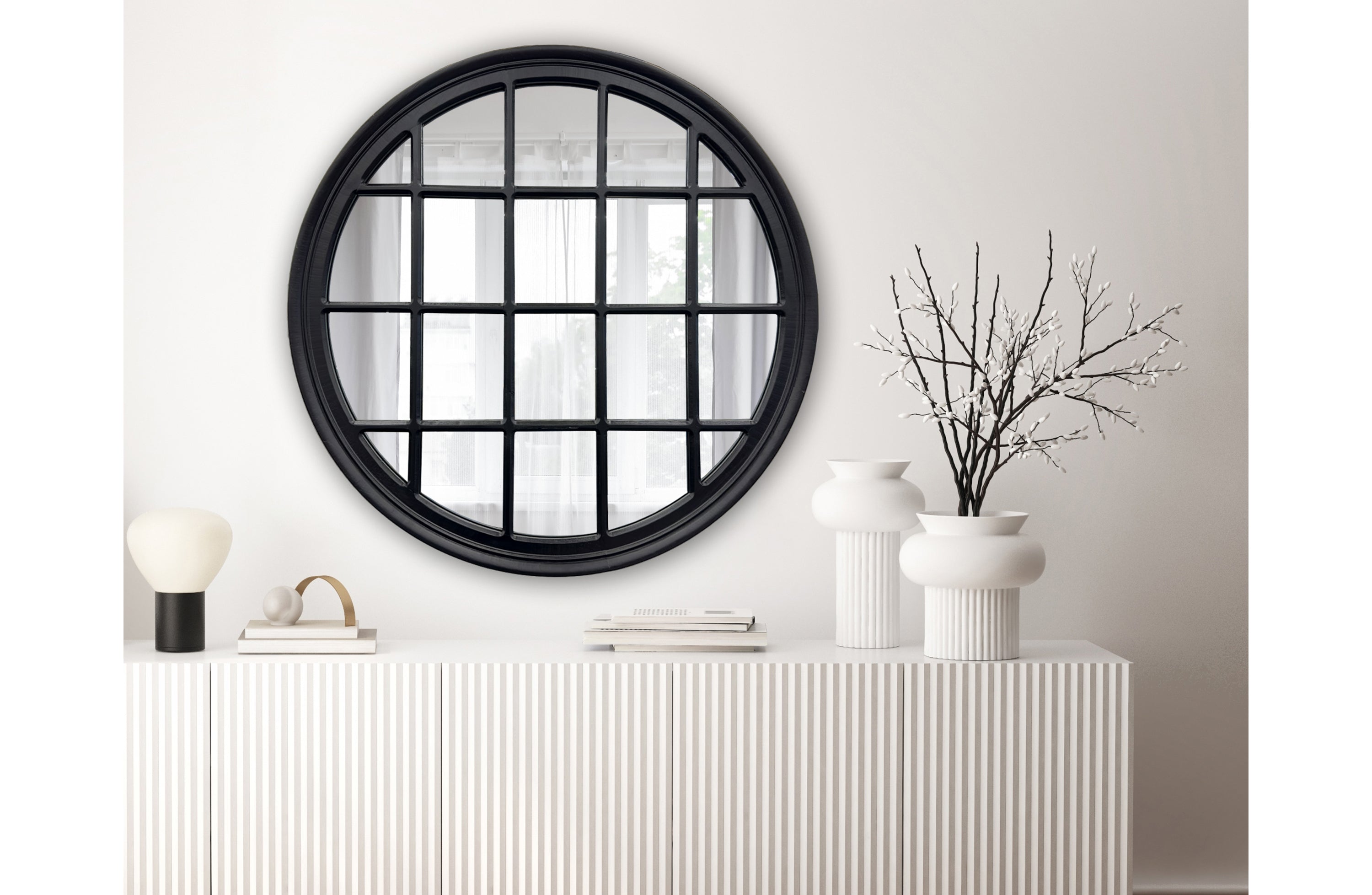 Black circular wall mirror with window-style grid design