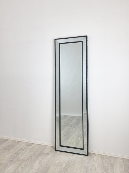 Full-length mirror with black beaded frame, upright standing on floor