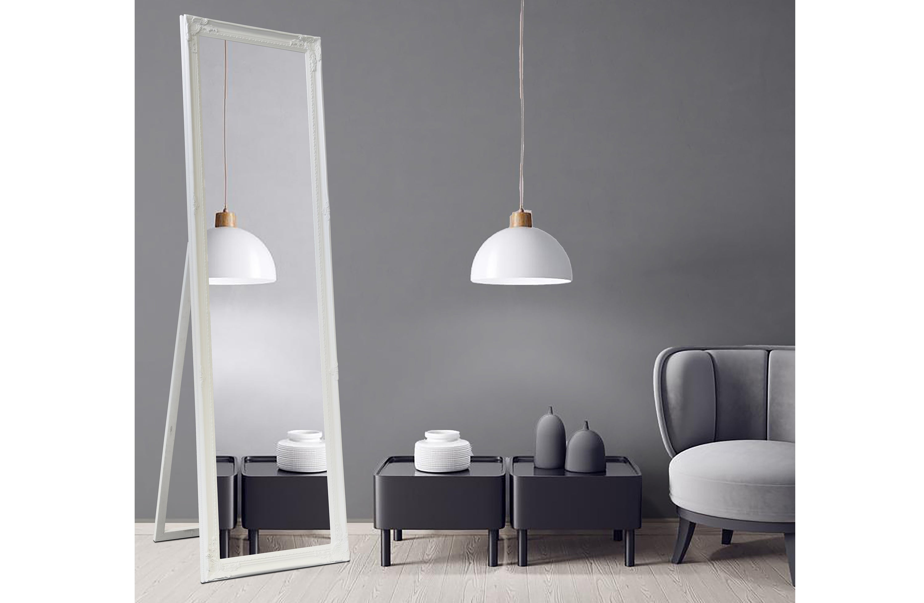 Ornate white freestanding mirror with tall arched frame and decorative trim