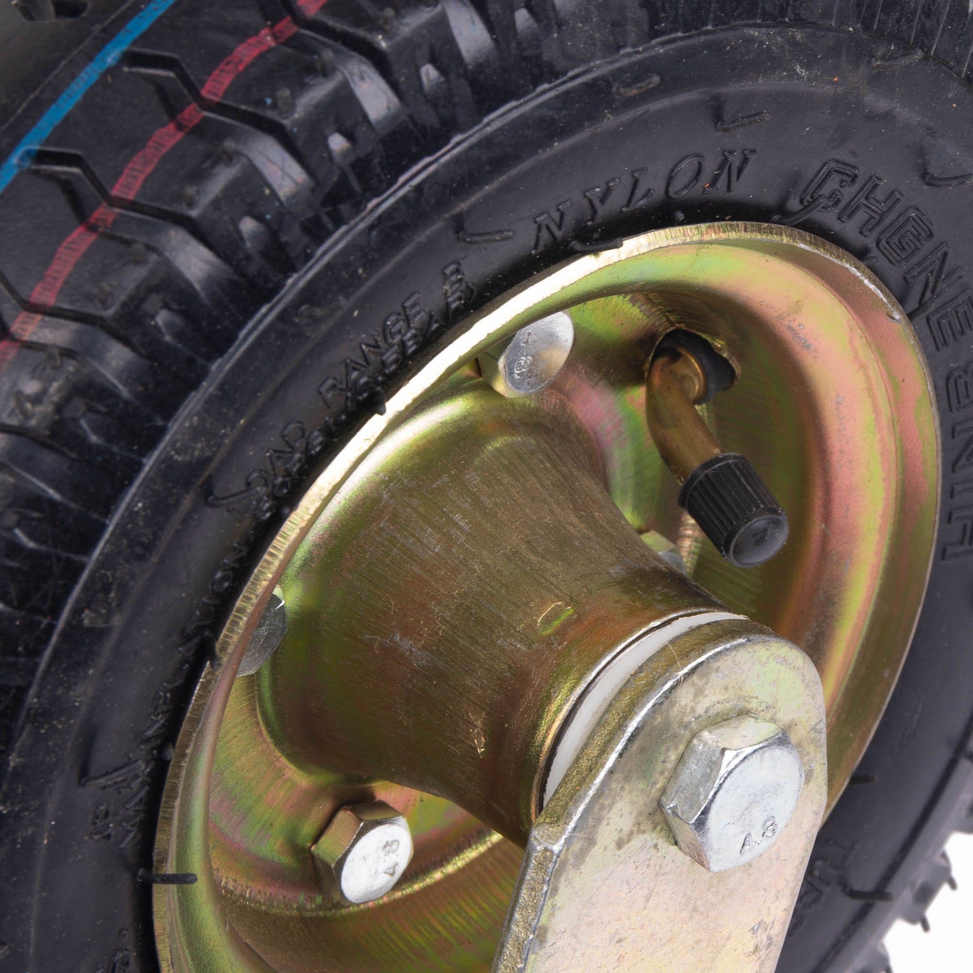 Pneumatic caster tire close-up with metal hub and axle mounting hardware