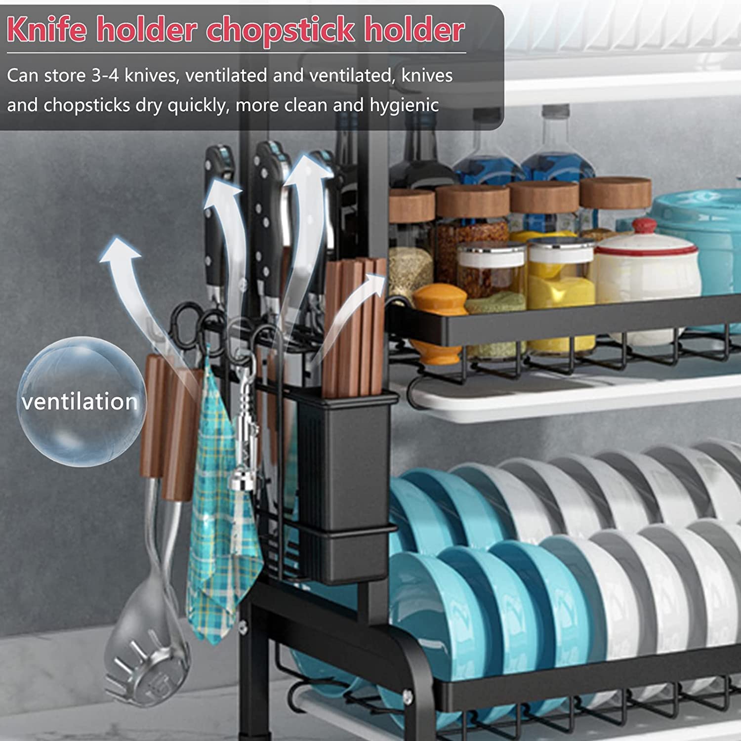 Dish rack with knife and chopstick holder next to stacked plate drying racks
