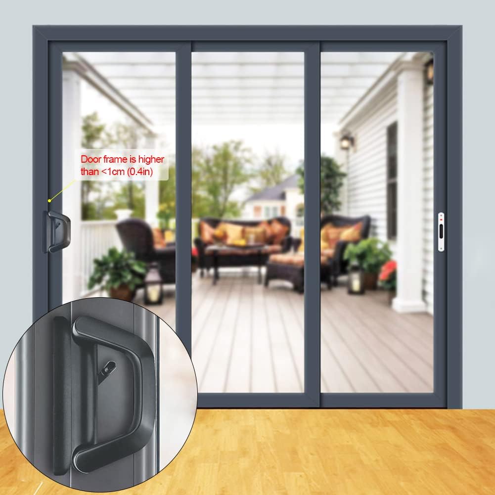 Black mortise lock handle on sliding patio door frame with key cylinder